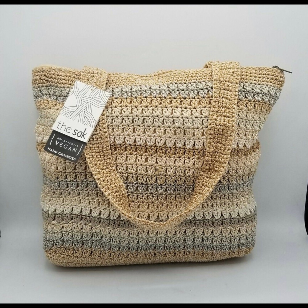 The sak hand crocheted, peta-approved vegan purse. New with tags.